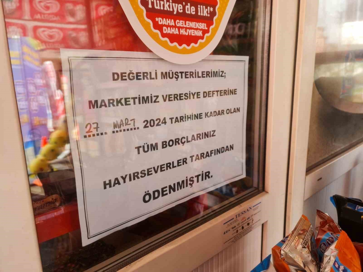Hayırsever, bakkalın veresiye defterindeki borçları ödedi
